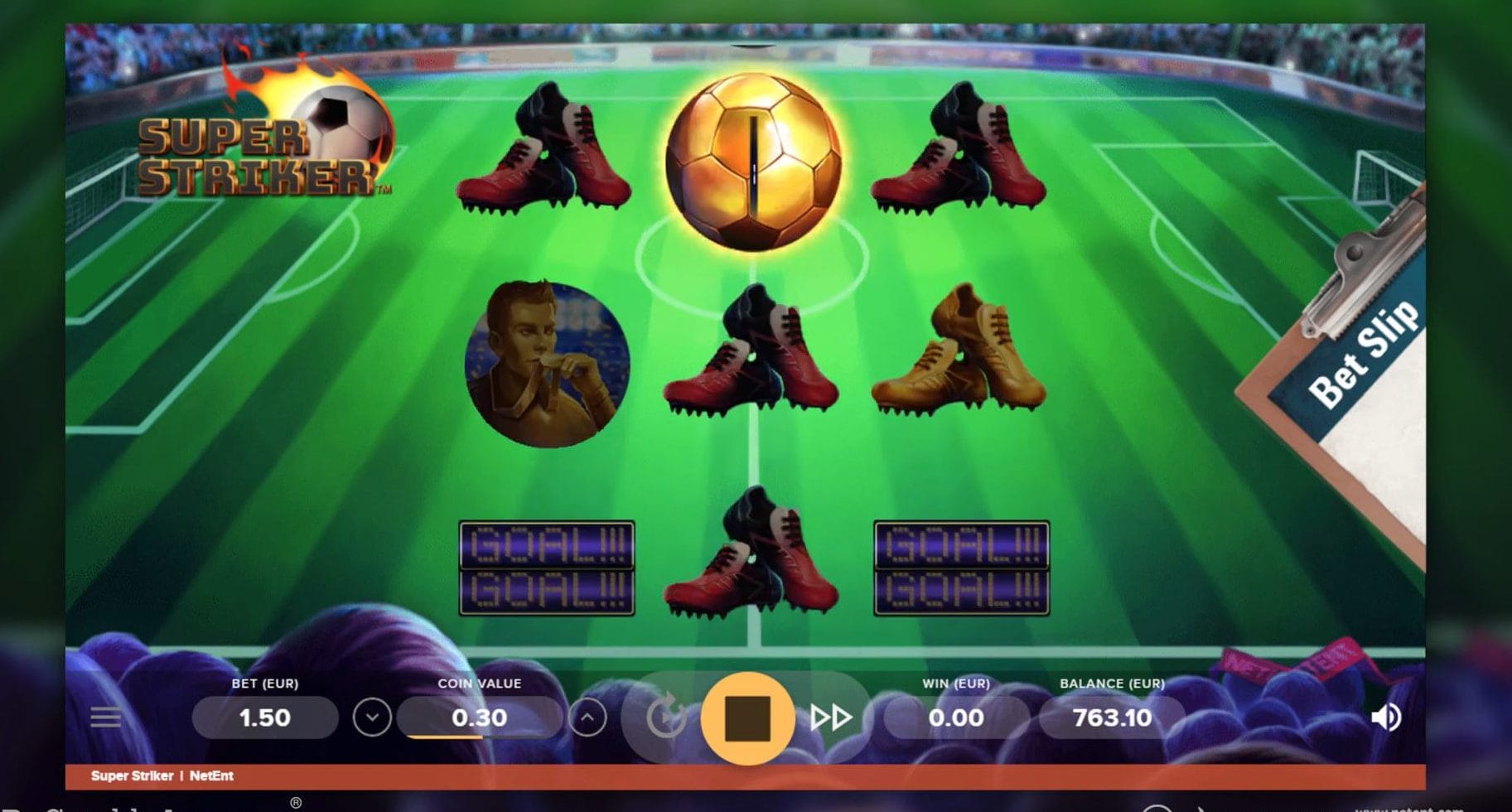 Super Striker slot screenshot with a soccer field in the background and a golden soccer ball.