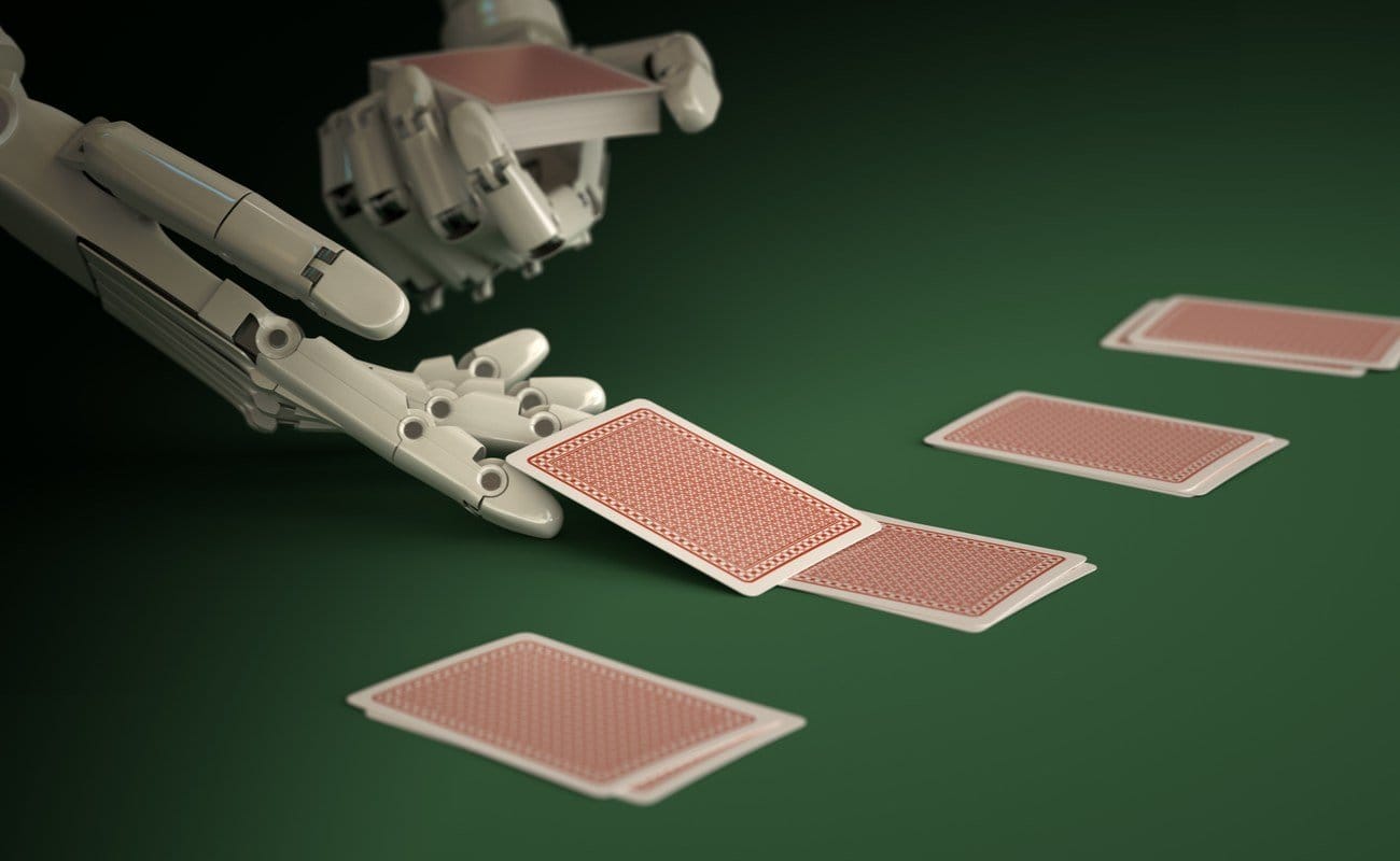 Robot croupier dealing cards on green felt casino table