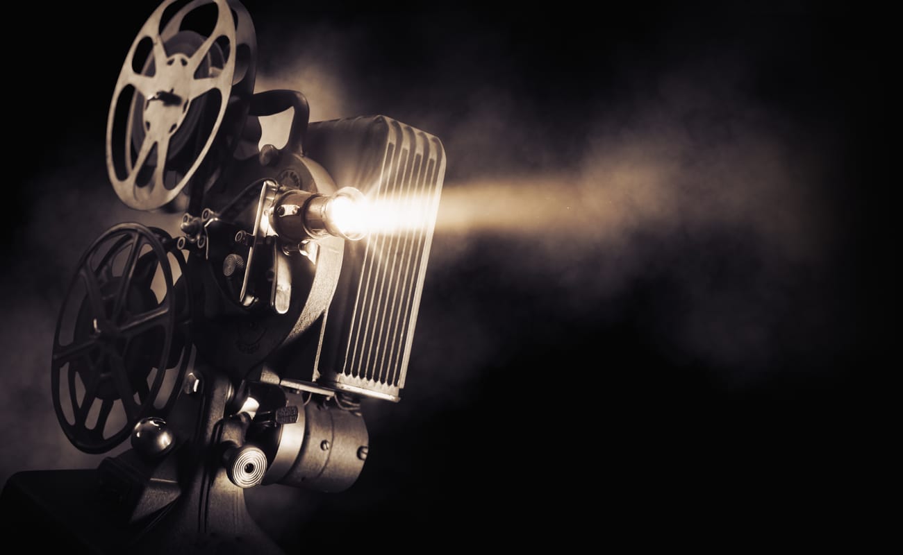 Sepia image of a movie projector.