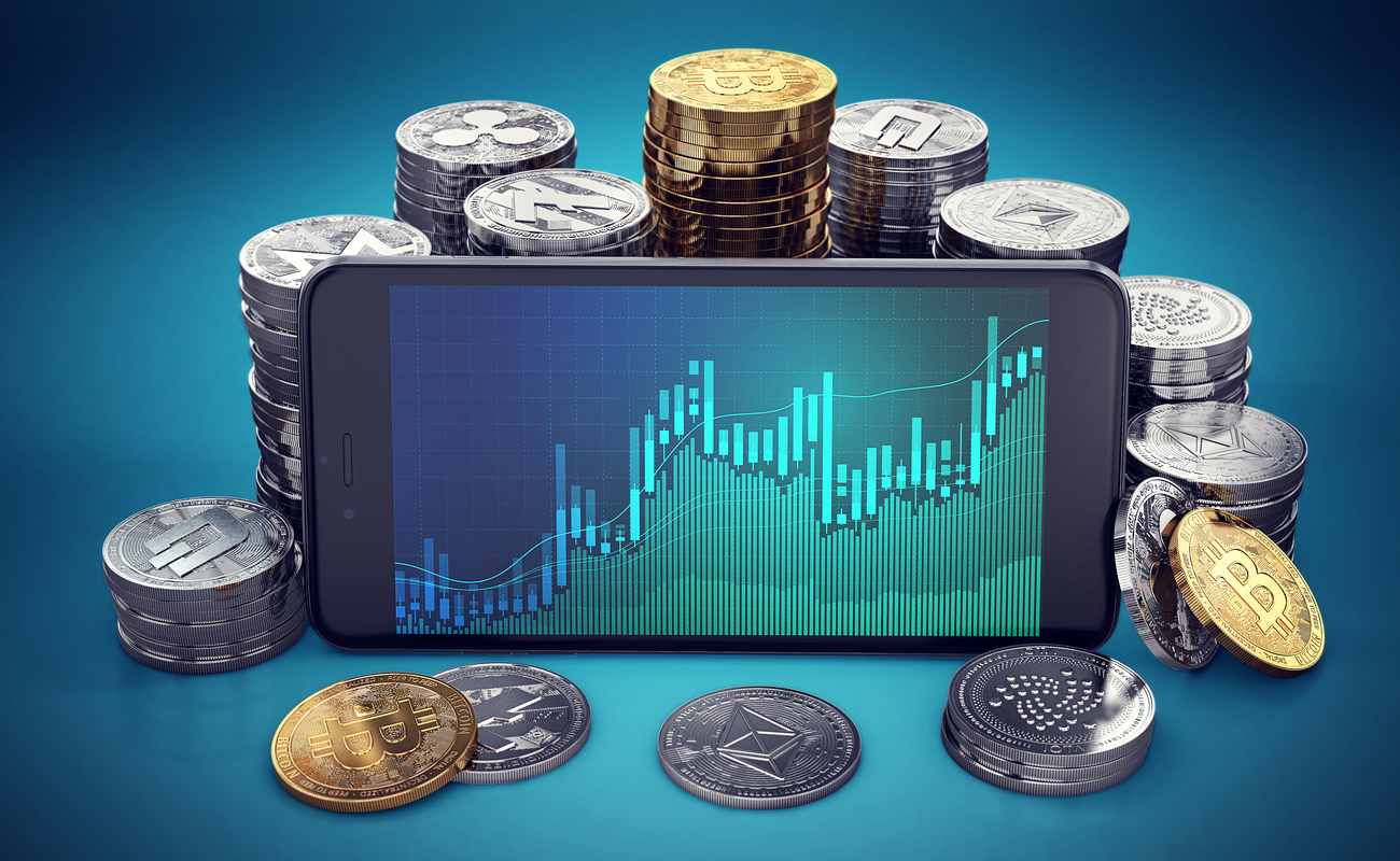 Bitcoin and altcoins with a smartphone showing a graph.