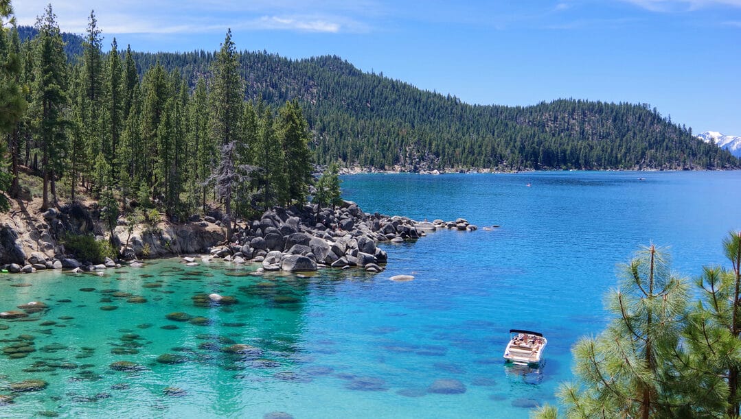 A boat out on the blue waters of Lake Tahoe.
