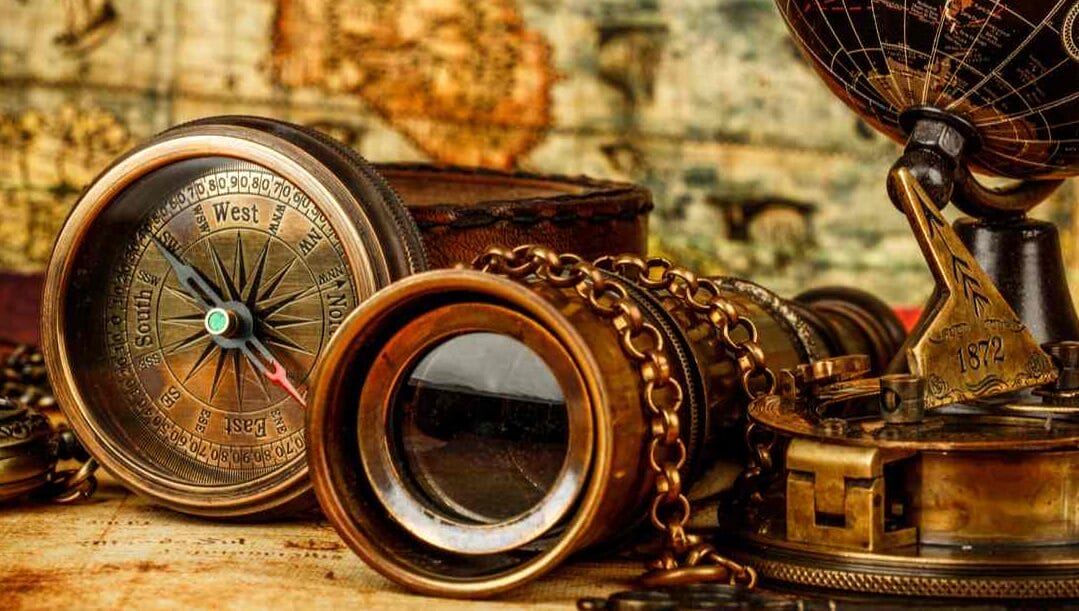 A number of historical items, including a compass, eyeglass and sundial.