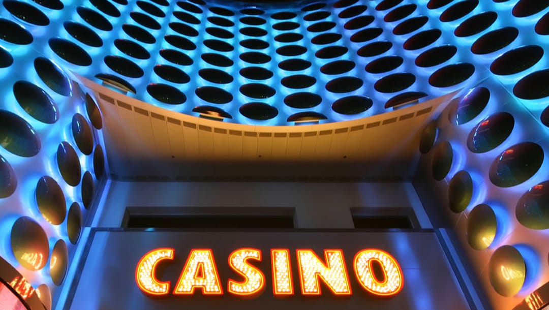 The word casino spelled in lights outside a casino.