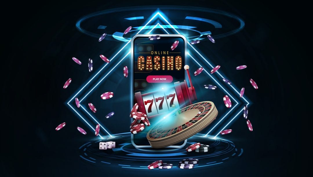 Smartphone with the words online casino on the screen surrounded by casino paraphernalia.