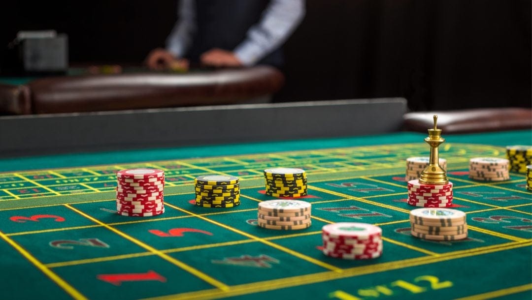 Blackjack Table with the multicolor ship on it.