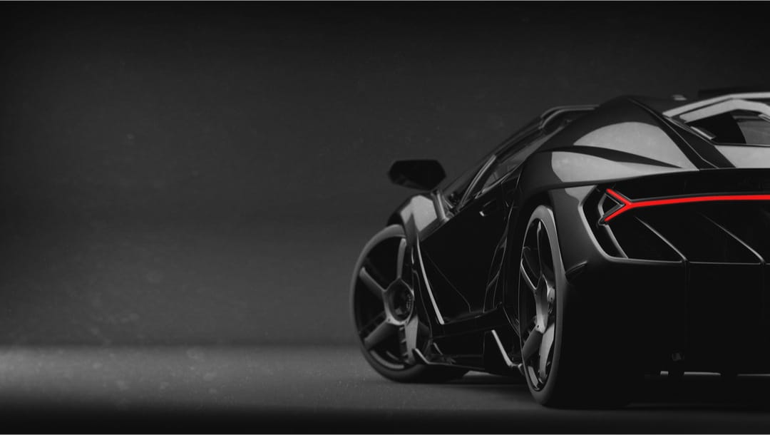 A 3D rendering of a black exotic car.