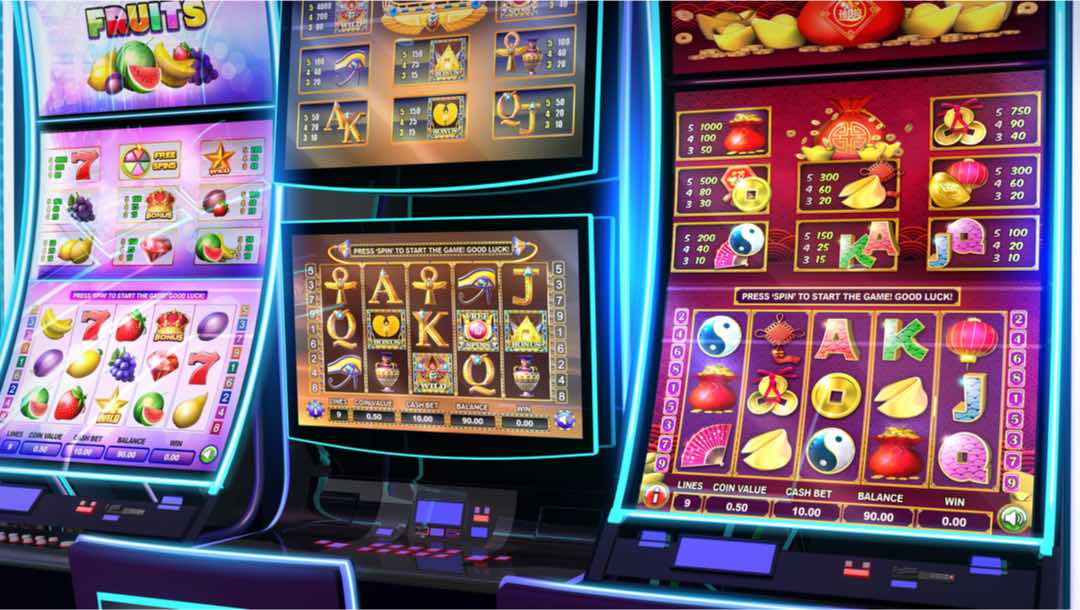 A range of online slots games on computer screens.