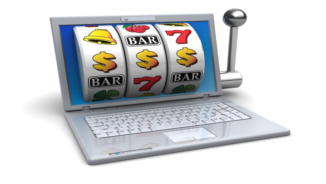 A laptop with an online slot illustration.
