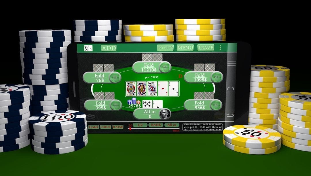 A game of online poker on a smartphone, surrounded by stacks of poker chips.