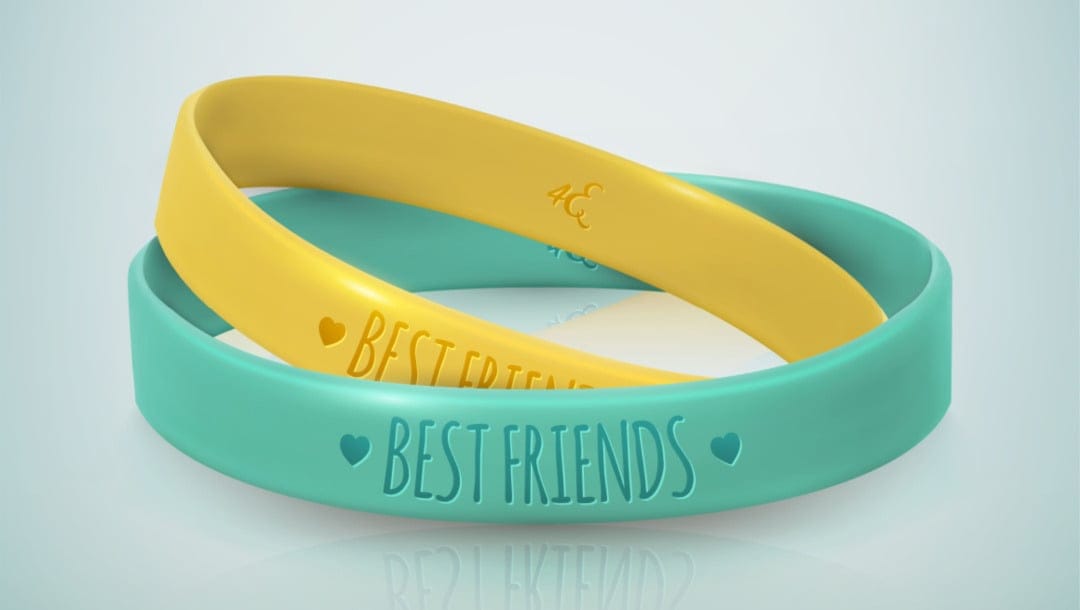 Two friendship bracelets with “best friends” inscribed on them.