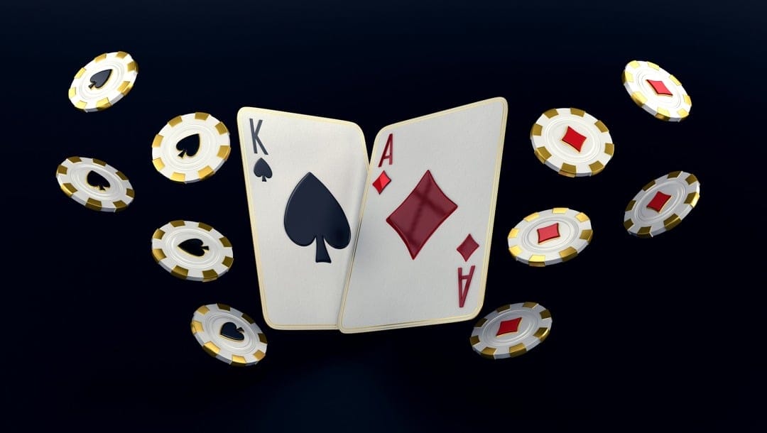 Two cards surrounded by floating casino chips.