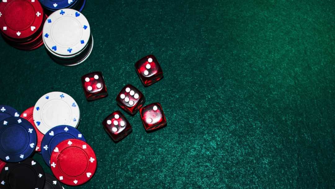 Aerial view of some dice and poker chips.