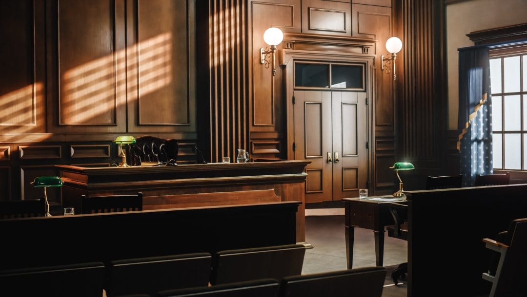An empty, American-style courtroom.