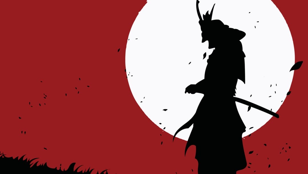 The black silhouette of a samurai against a white moon. The sky is a dark red and is foregrounded by leaves and grass blown up by the wind.