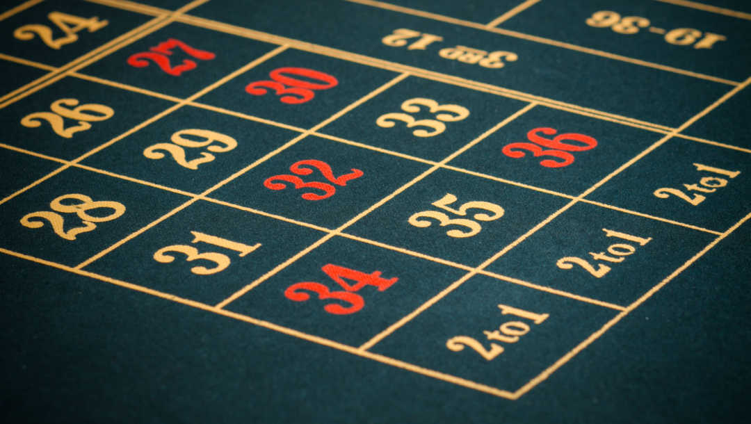 Close-up of the numbers on a roulette table.