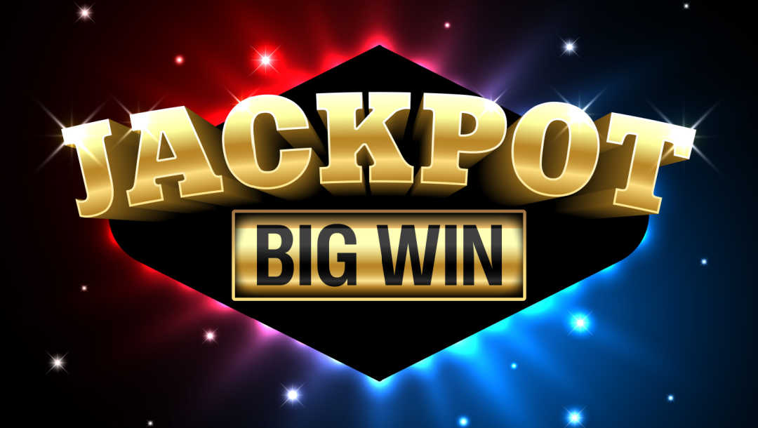 A “Jackpot Big Win” sign against a multi-colored background.