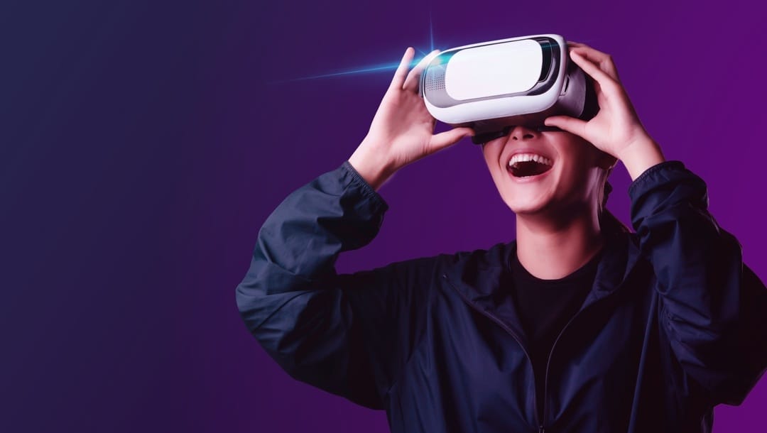 A young woman using a VR headset.