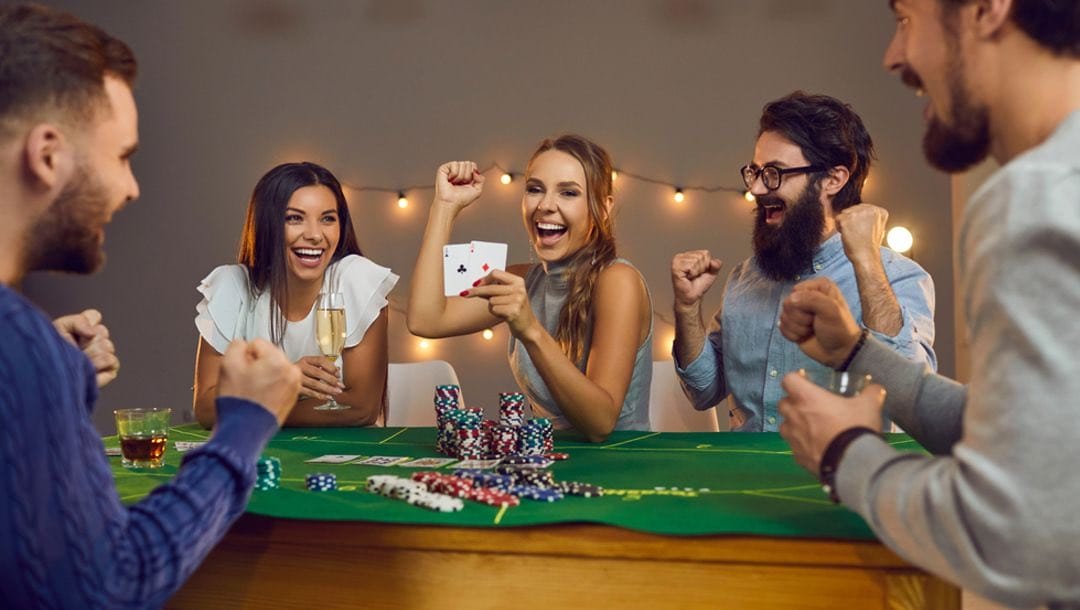 A group of friends playing casino games in the living room.
