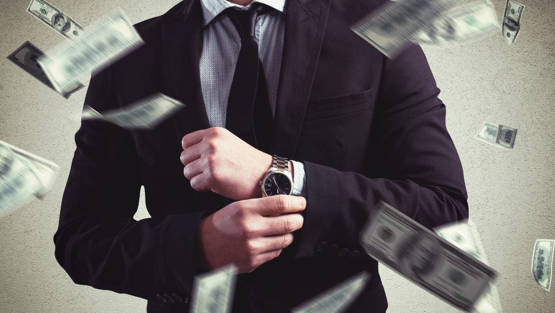 a man wearing a suit and a watch with money notes flying around him