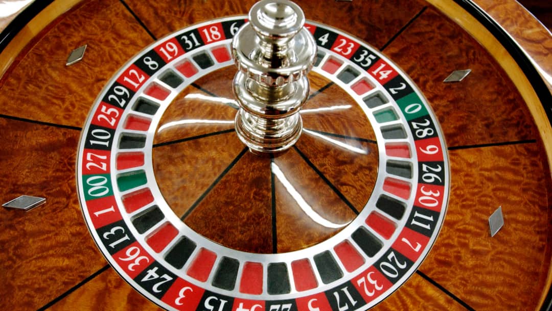 A close-up of an American roulette wheel.