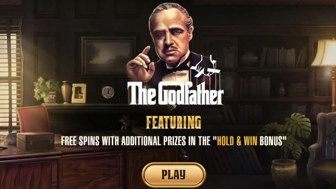 The loading screen for The Godfather, the online slot game by Atlantic Digital.