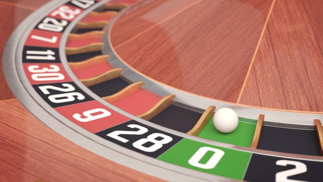 Roulette wheel with a white ball.