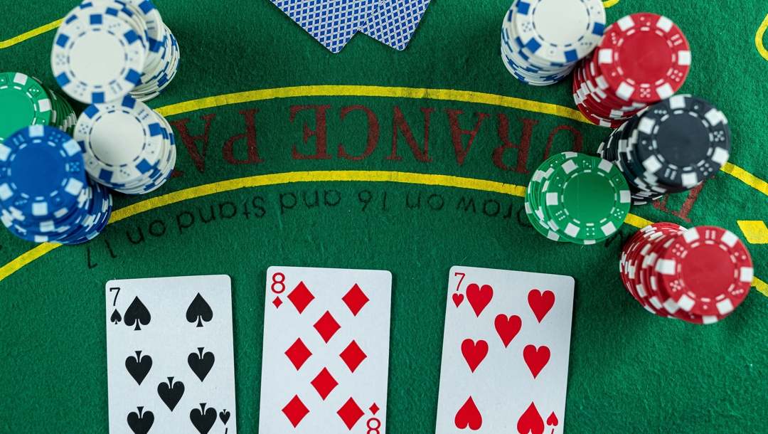 Poker cards with three of a kind or set combination