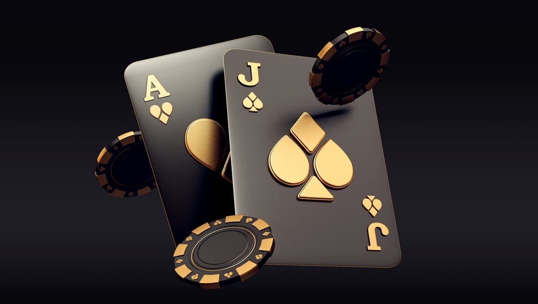 Two gold and black playing cards and three casino chips against a black background. The cards are an ace of hearts and a jack of spades. They partially overlap each other.