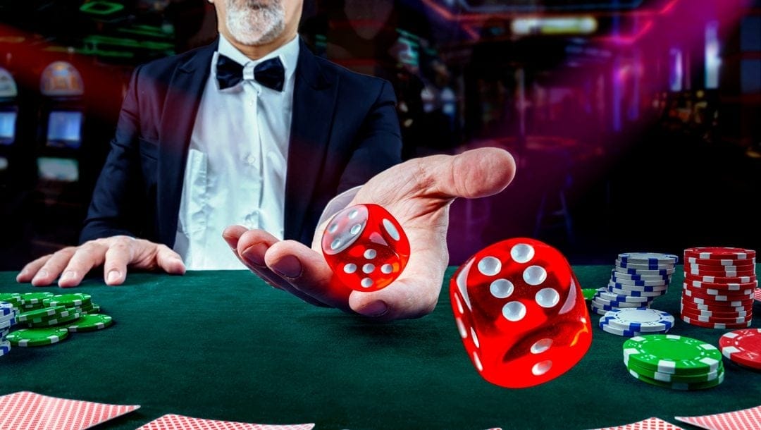 Croupier throwing dice at a casino poker table