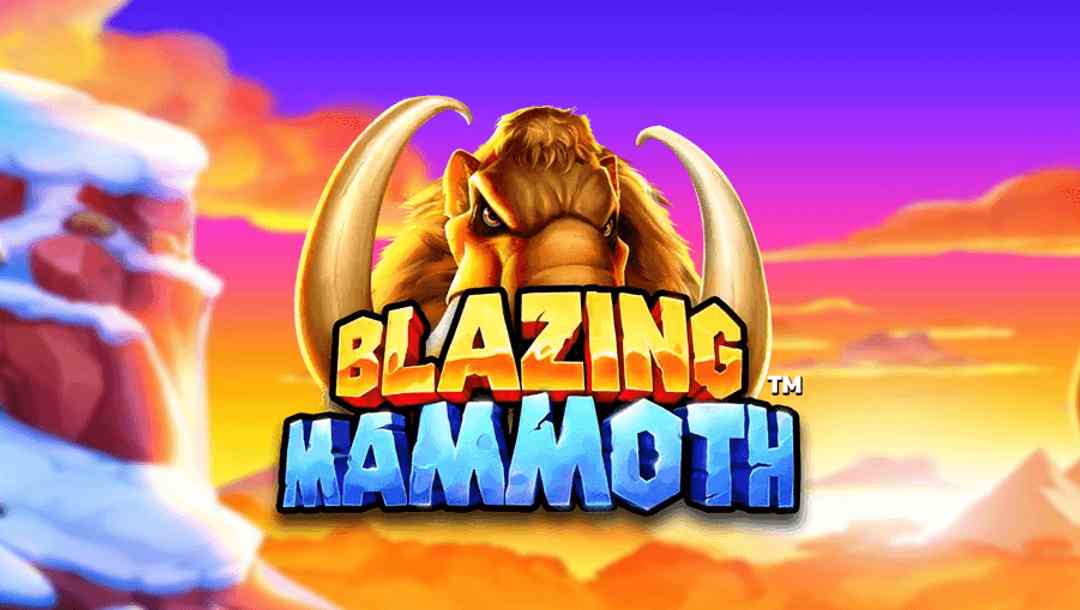The title screen for Blazing Mammoth online slot with a mammoth in front of a setting sun and a snowy mountain