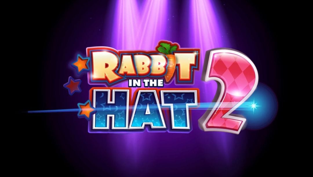 A screenshot of the The Rabbit in the Hat 2 game title screen for the trailer. The game name is lit up by bright purple lights as a blue star flies across the screen.