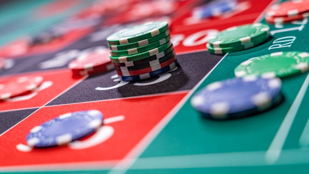 A roulette table with casino chips.