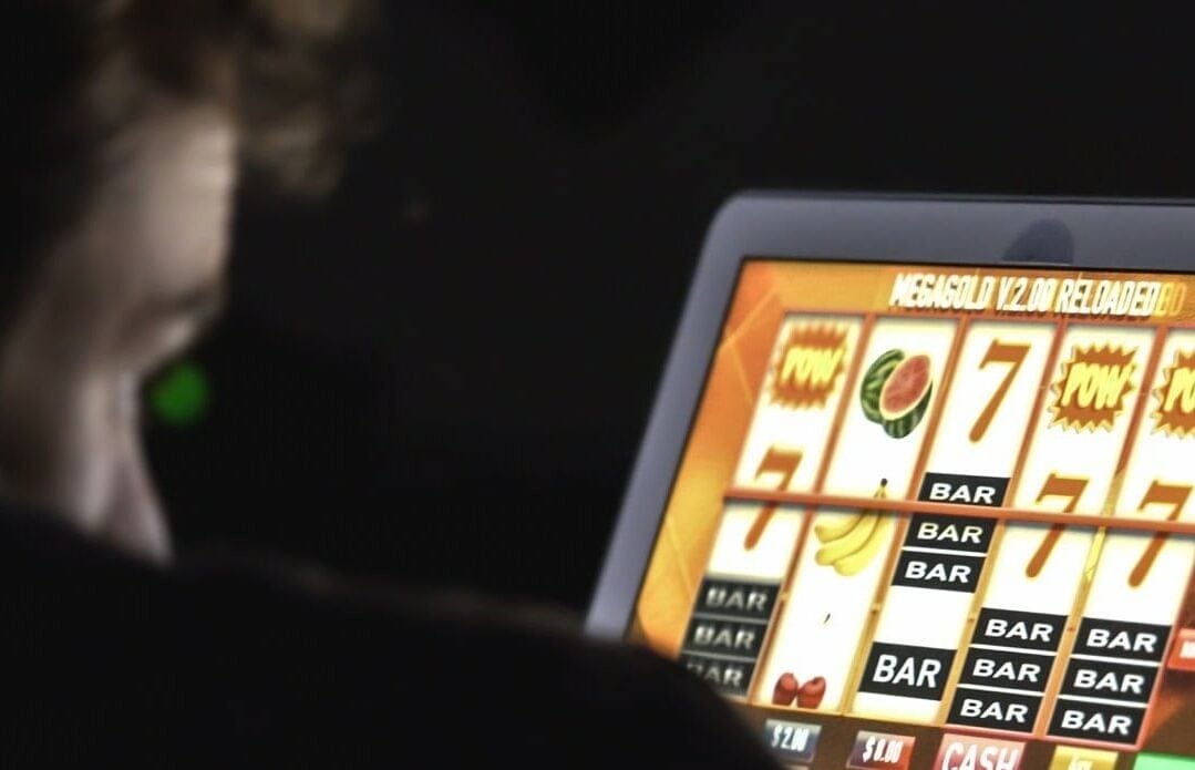 A person playing an online slot game.