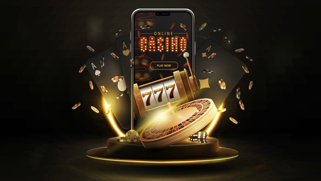 A mobile phone with the words “online casino” and “play now” and a slot reel on its screen. It rests on a circular platform surrounded by a roulette wheel, dice, casino chips, and playing cards. Spotlights shine from behind the mobile phone.