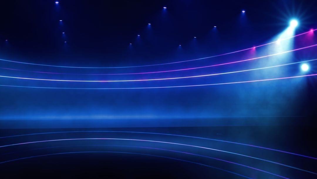 A fictional game show studio with a blue and purple aesthetic, lit up by bright lights.
