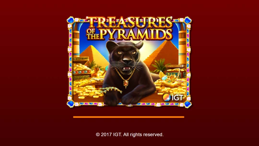 A screenshot of the loading screen for Treasures of the Pyramids by IGT, featuring a black panther wearing gold jewelry, surrounded by piles of treasure with pyramids in the backgound.