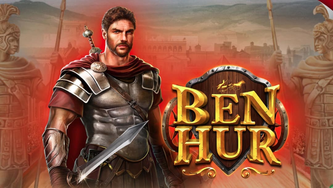 The Ben Hur online slot loading screen features the game logo written against a wooden shield and a Roman soldier holding a sword, featured in front of an ancient Roman city alongside two stone statues.