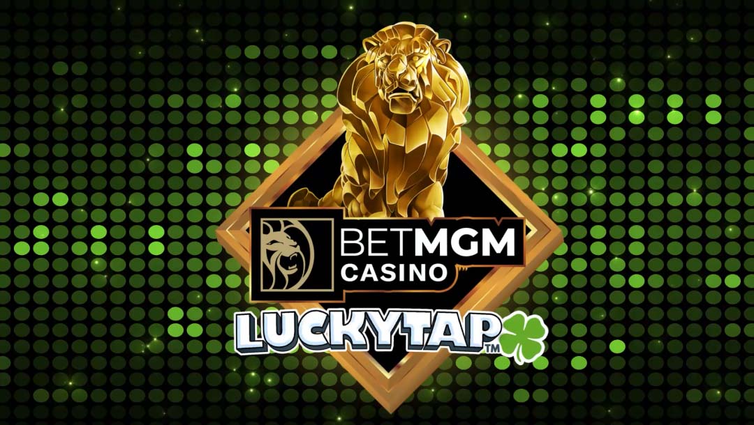 The title screen for BetMGM Lion’s Gold. The background is an array of green LED lights at various brightness levels. In the foreground is the BetMGM Casino logo with the golden lion and the LuckyTap branding.