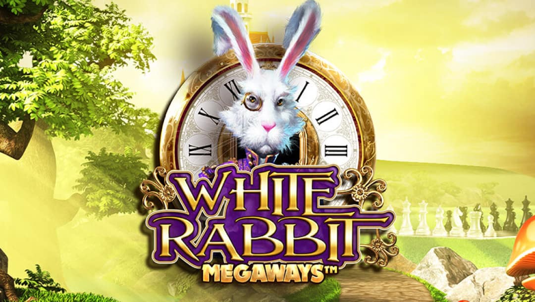 A screenshot of the White Rabbit online slot title screen. The backdrop is brightly lit, with a forest on the left and a chessboard on the right. In the center is a distinguished white rabbit wearing a monocle with a pocket watch behind him. The game’s name is in front of the rabbit in a gold and purple font.