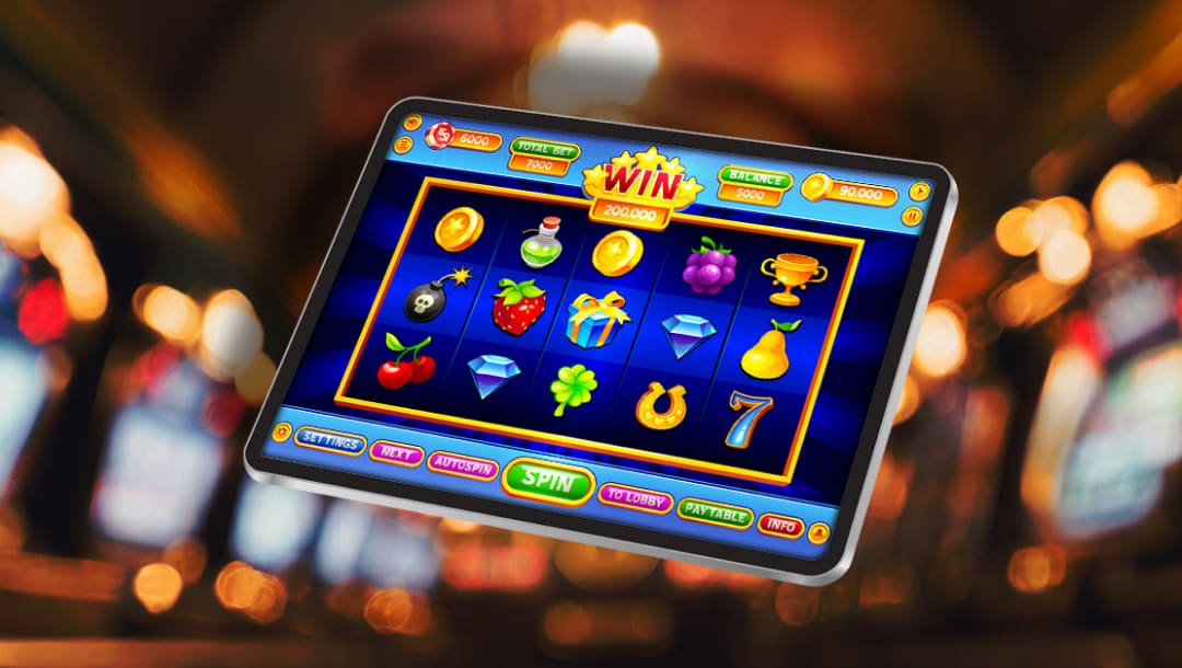 An online slot game being played on a tablet with a blurry casino slot room in the background.