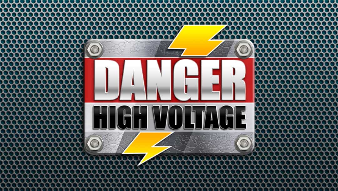 Danger High Voltage online slot logo in silver, red, and black. There is a yellow lightning bolt. The background shows a silver material.