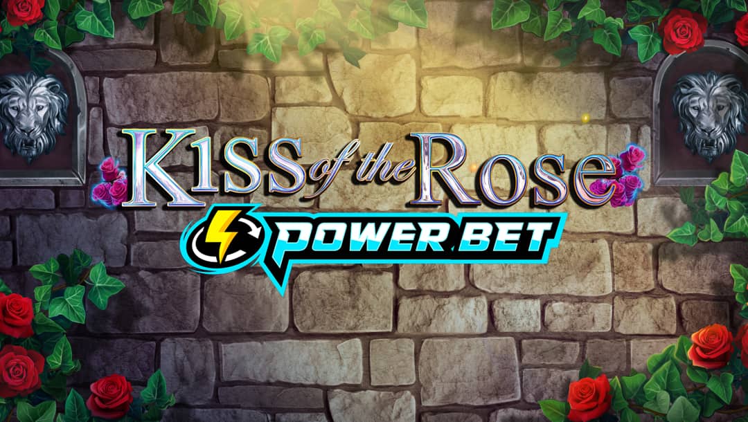 The title screen for Kiss of the Rose Power Bet, featuring the game logo in front of a stone wall. Red roses and lush clusters of leaves are in each corner of the image and there are two lion head sculptures on the wall.