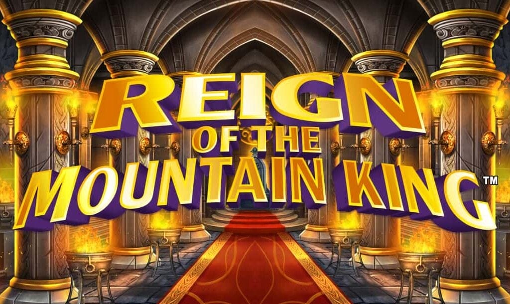 The Reign of the Mountain King title screen. The background is a brightly lit hall in an underground palace with stone walls and columns with golden trimming. In the foreground is the game title.