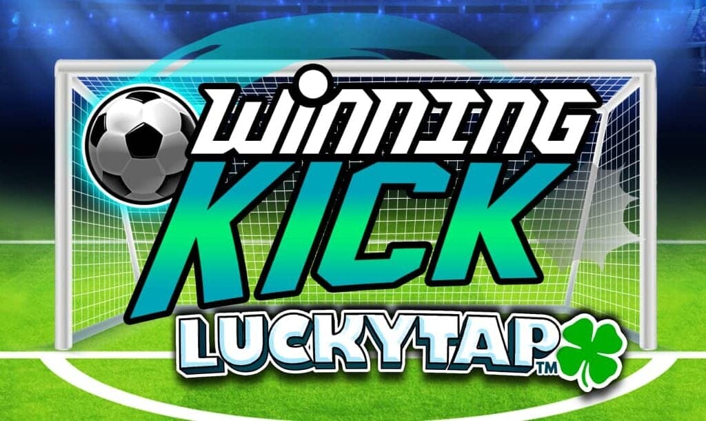 The Winning Kick LuckyTap title screen. The background shows dark stadium seats with bright lights shining down onto a goal post on one side of a soccer field. In the foreground is the game title featuring a soccer ball with a blue trail behind it.