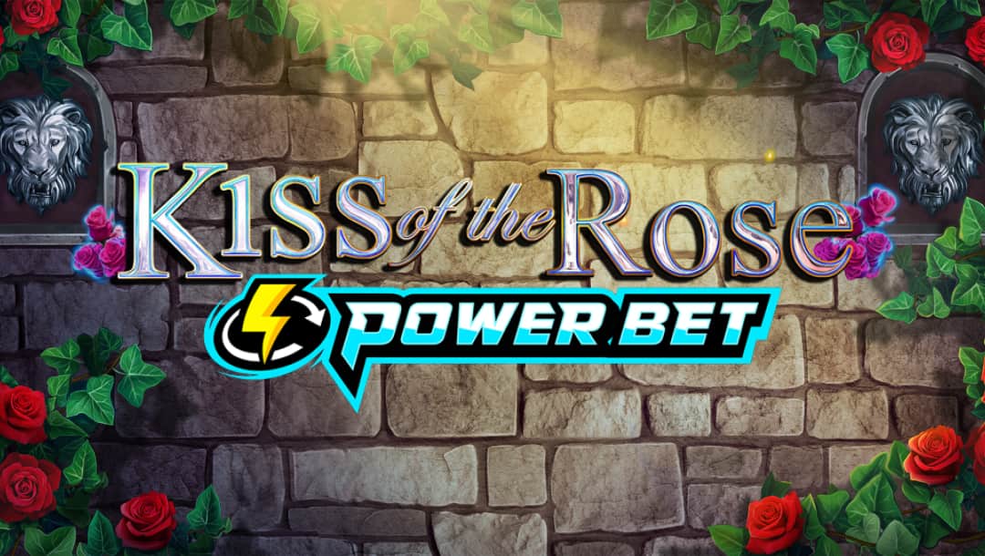 The title screen of the slot game Kiss of the Rose: Power Bet featuring elegant, medieval-style lettering against a stone castle wall. The words Kiss of the Rose are adorned with roses and vines, while the 'Power Bet' logo has a bold, lightning-themed design. Two lion head carvings are visible on either side of the wall, adding a regal and mysterious atmosphere.