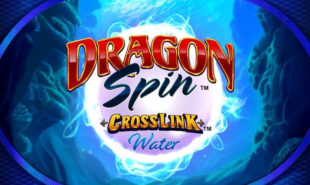 The Dragon Spin Crosslink Water title screen. The setting is a reef underwater with you looking through a large oval-shaped window. In the center of the screen is a glowing pearl-like object surrounded by strange energy. In front of the spherical object is the game title.