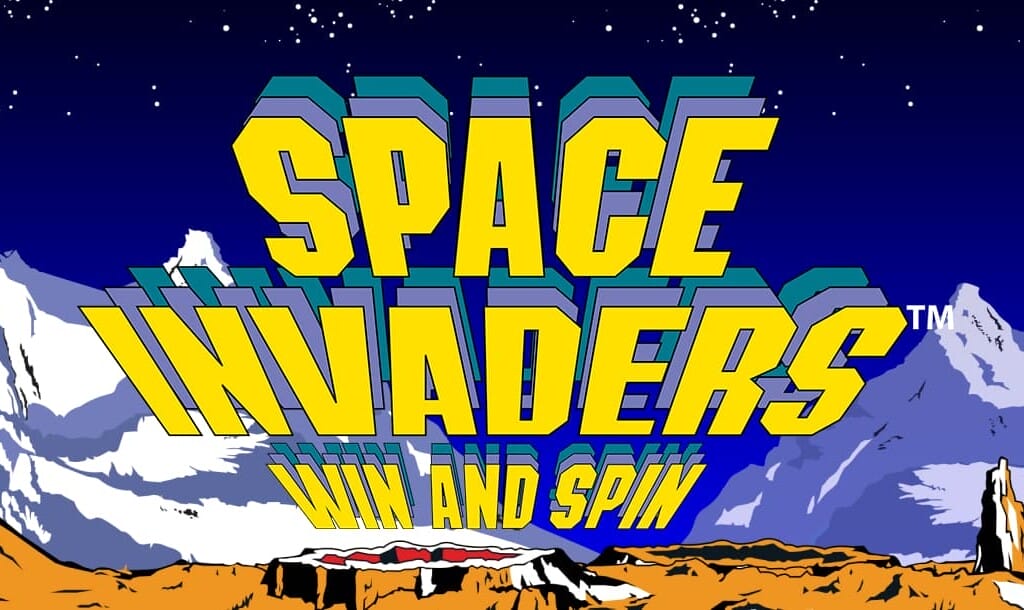 A bold and colourful title screen for the game “Space Invaders: Win and Spin.” The large yellow 3D-style lettering dominates the centre of the image, set against a dramatic, illustrated outer space landscape with rugged orange terrain, white mountains, and a starry night sky. The classic retro arcade aesthetic is reminiscent of vintage sci-fi and pixel art.