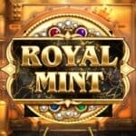 A loading screen featuring the gold Royal Mint game logo inside a gold border with a black and gold-flaked background. The logo is mounted on a gemstone-encrusted golden plate and placed in the entrance to a walk-in vault.