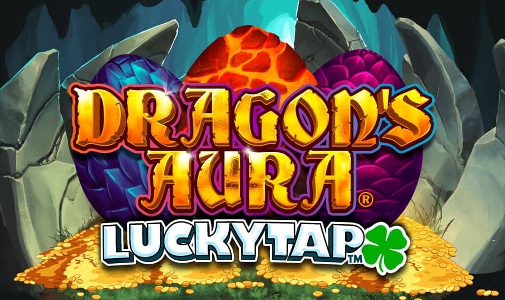 Title screen for the slot game "Dragon's Aura LuckyTap," featuring three large dragon eggs (purple, orange, and pink) resting on a pile of gold coins inside a rocky cave. The game's title is displayed in bold, glowing letters with a four-leaf clover symbol next to "LuckyTap."