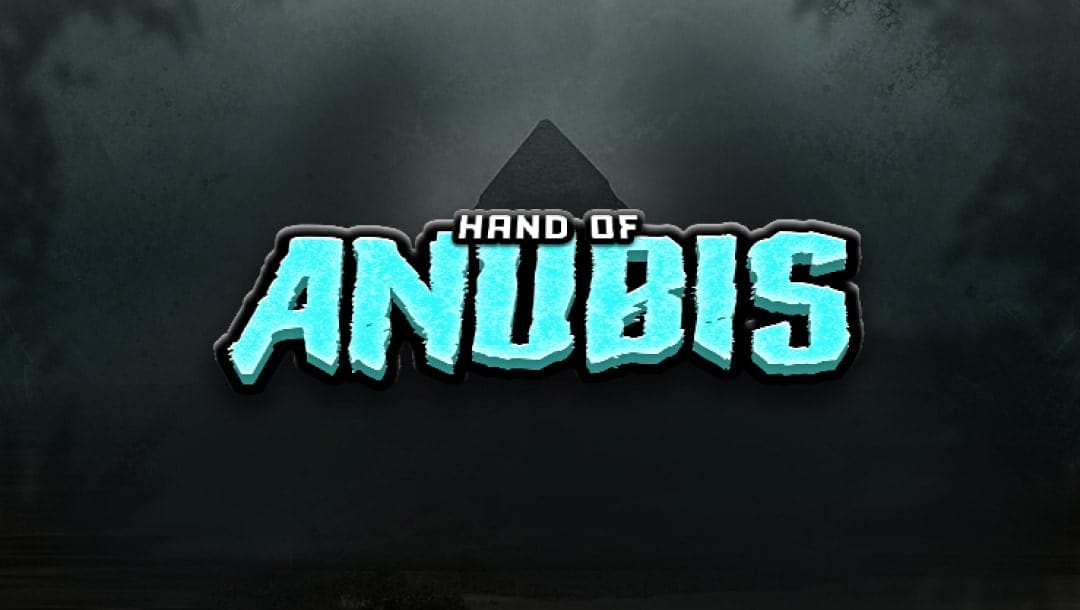 The game title Hand of Anubis appears in eerie blue letters against a dark background with a pyramid under pale moonlight.